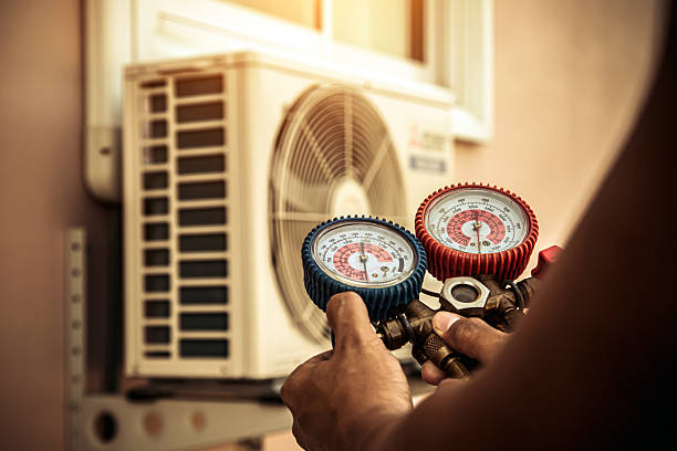 Professional Emergency Hvac technician working in White Cloud, MI